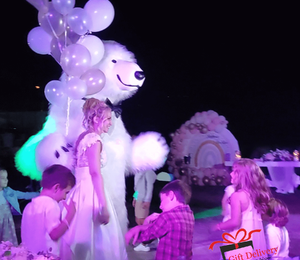 The White Polar Bear came to the wedding to deliver the gift to the bride and groom. Gift Delivery. Wedding gift. Polar bear surprise. White Polar Bear at the wedding.